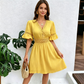 Rochie elegantă cu decolteu în V și detalii cu dantelă decupată